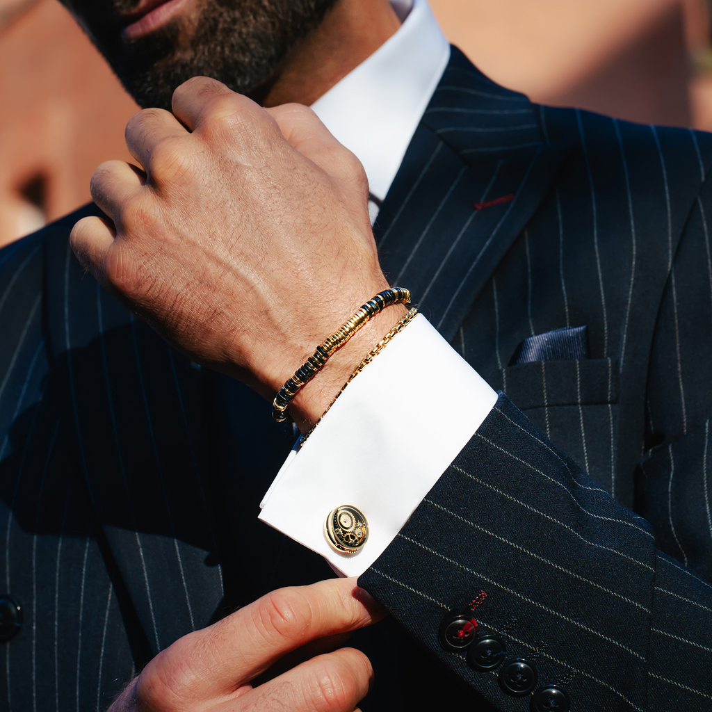 Carousel Gear Cufflinks In Yellow Gold Plated Base Metal With Black Enamel