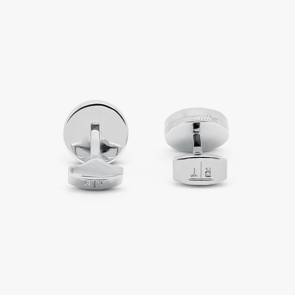 Star weave cufflinks with white bronze plating, featuring a plaited rope design, central star motif, and grey enamel detailing.