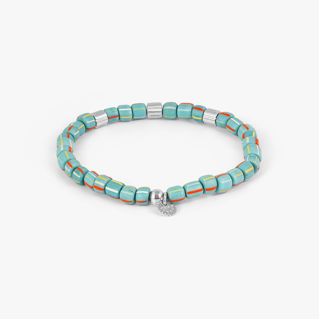 A rhodium-plated sterling silver bracelet with sky blue java glass beads and silver accents.