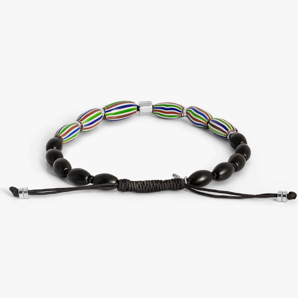 Black macramé bracelet with 6mm black agate beads and Venetian watermelon chevron glass accents, featuring pink and green layered tones and a rhodium-plated sterling silver adjustable closure.