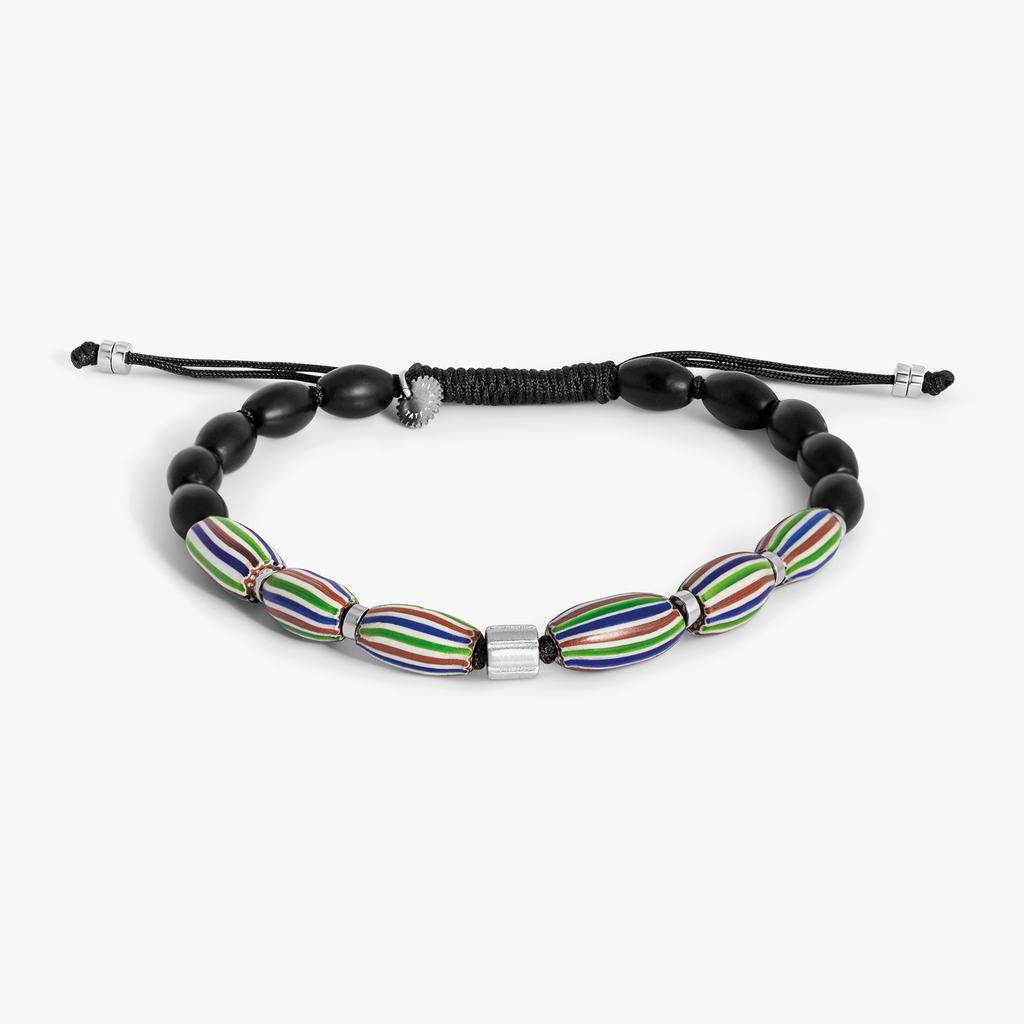 Black macramé bracelet with 6mm black agate beads and Venetian watermelon chevron glass accents, featuring pink and green layered tones and a rhodium-plated sterling silver adjustable closure.