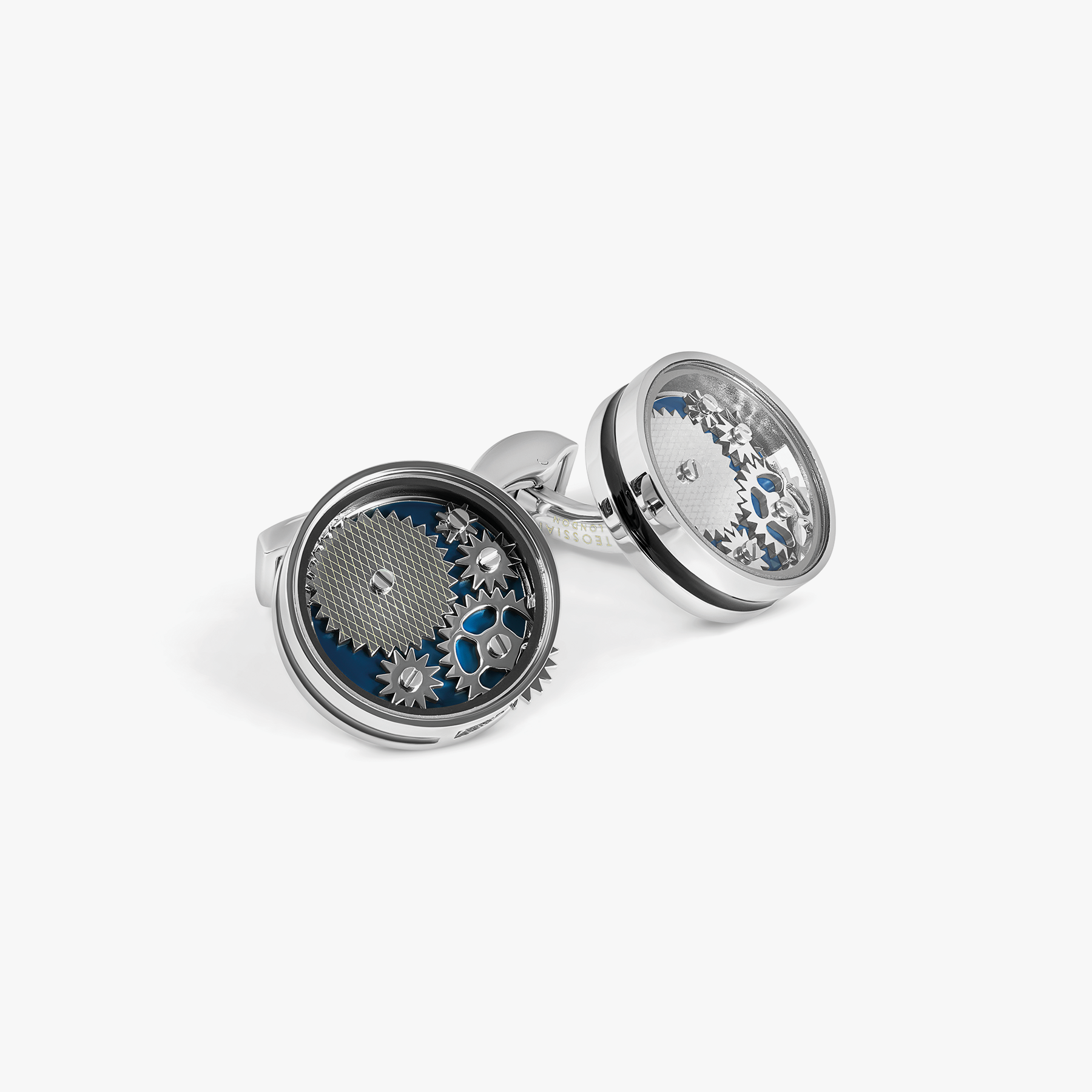 A pair of blue palladium plated carousel gear cufflinks with mechanical movement.