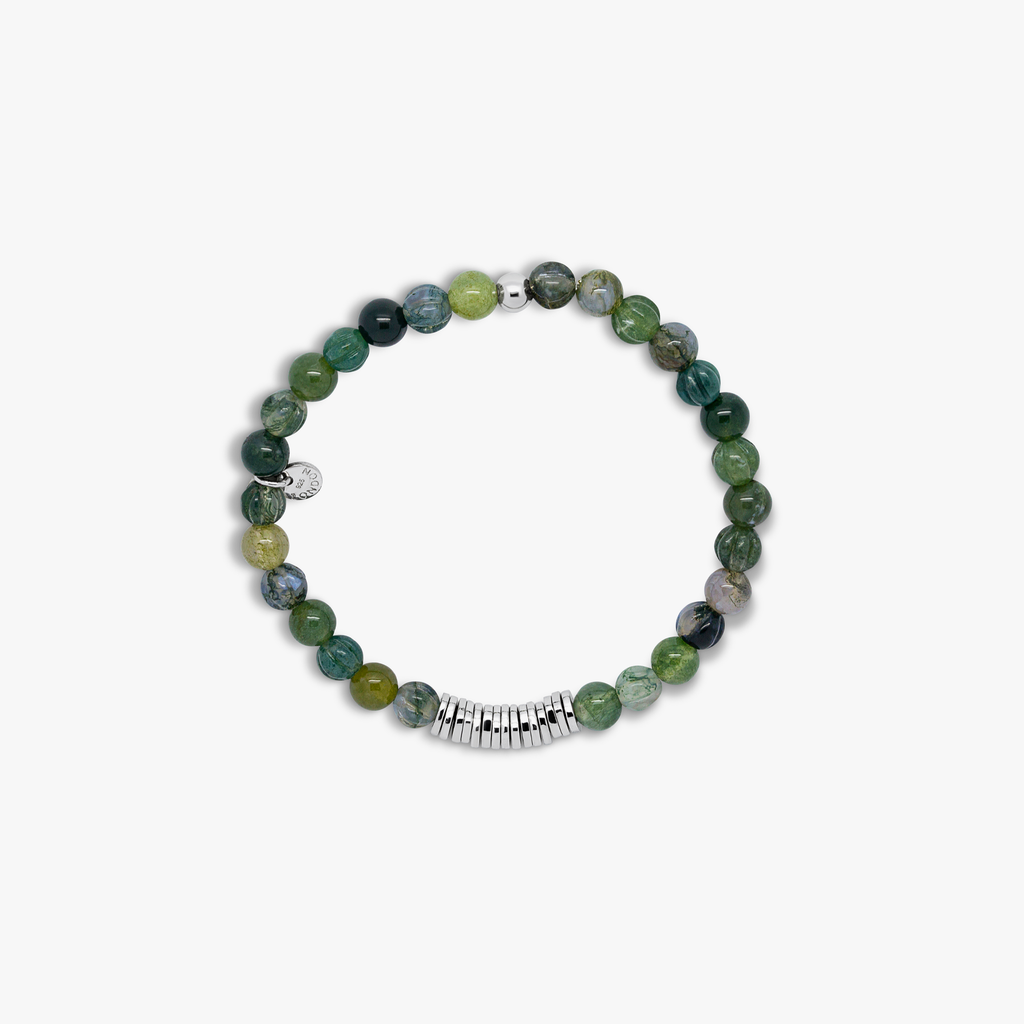 A rhodium-plated silver bracelet with green moss agate beads and sterling silver discs