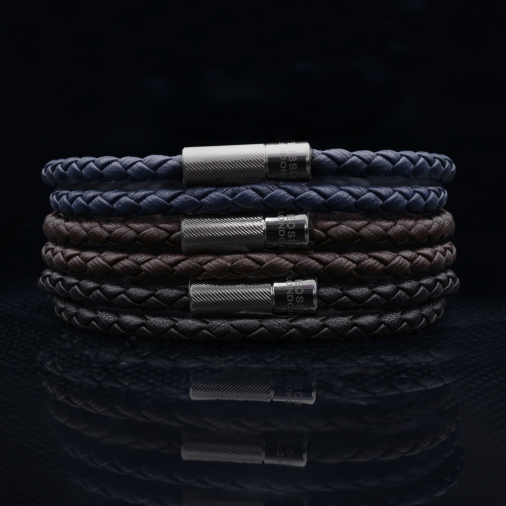 A double wrap navy leather bracelet with a black ruthenium plated sterling silver clasp.