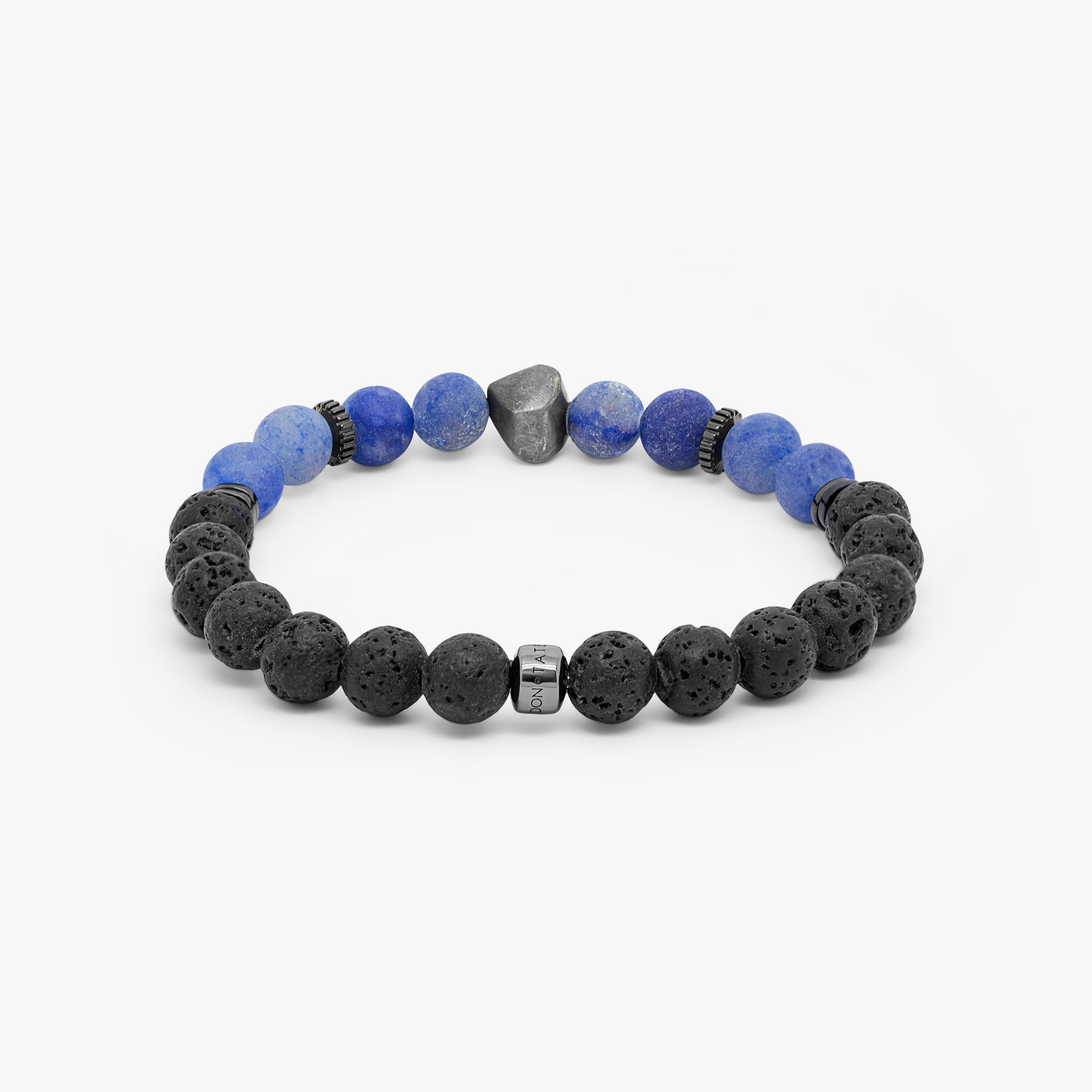 A bracelet with a mix of dark and light blue beads, some shaped like lava rocks, and black rhodium plated sterling silver detailing.
