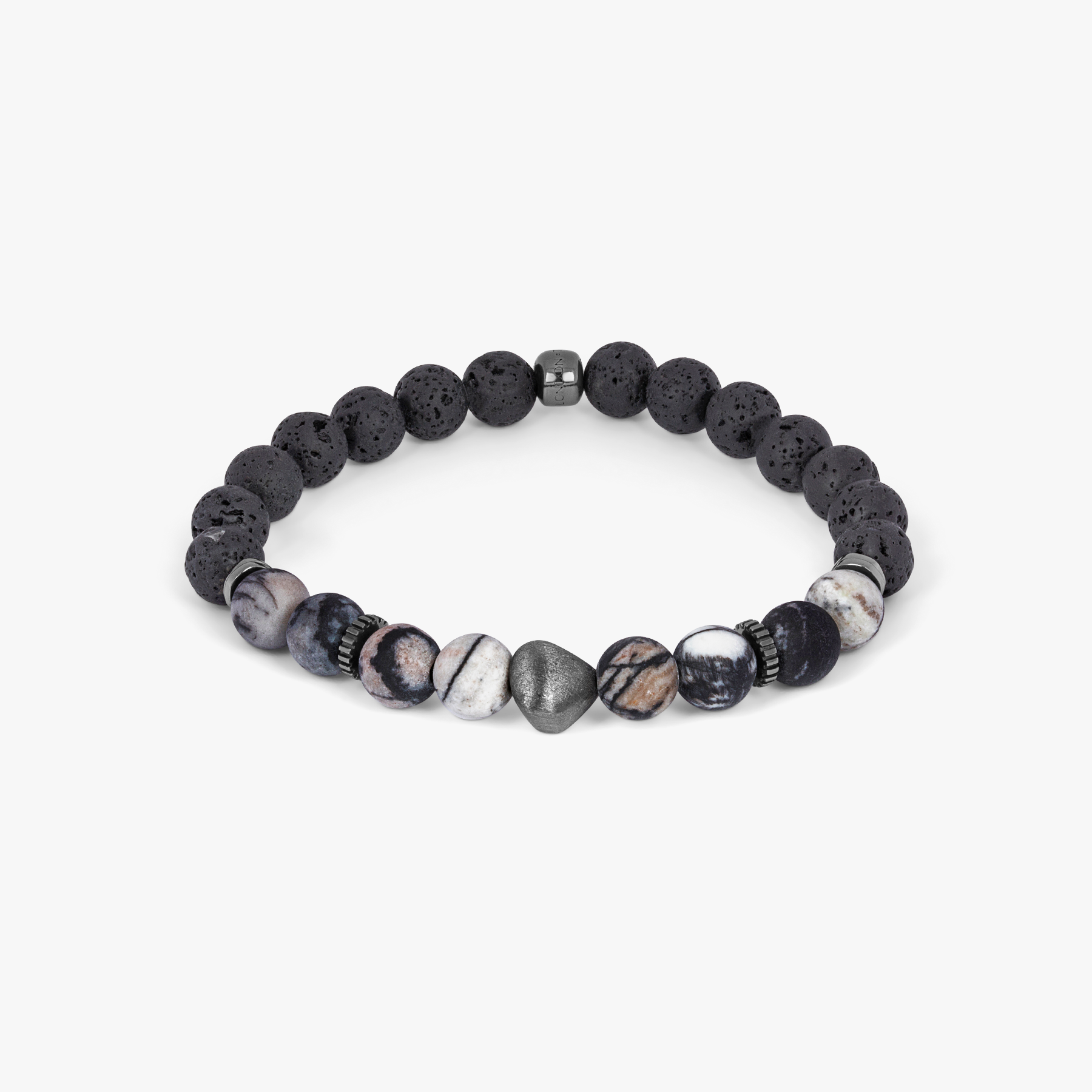 A bracelet with a combination of black and multicolored beads, possibly spiderweb jasper and raw volcanic lava beads, with black rhodium plated sterling silver detailing.