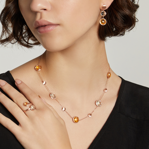 Woman wearing Kensington necklace in citrine, prasiolite and 14k satin rose gold