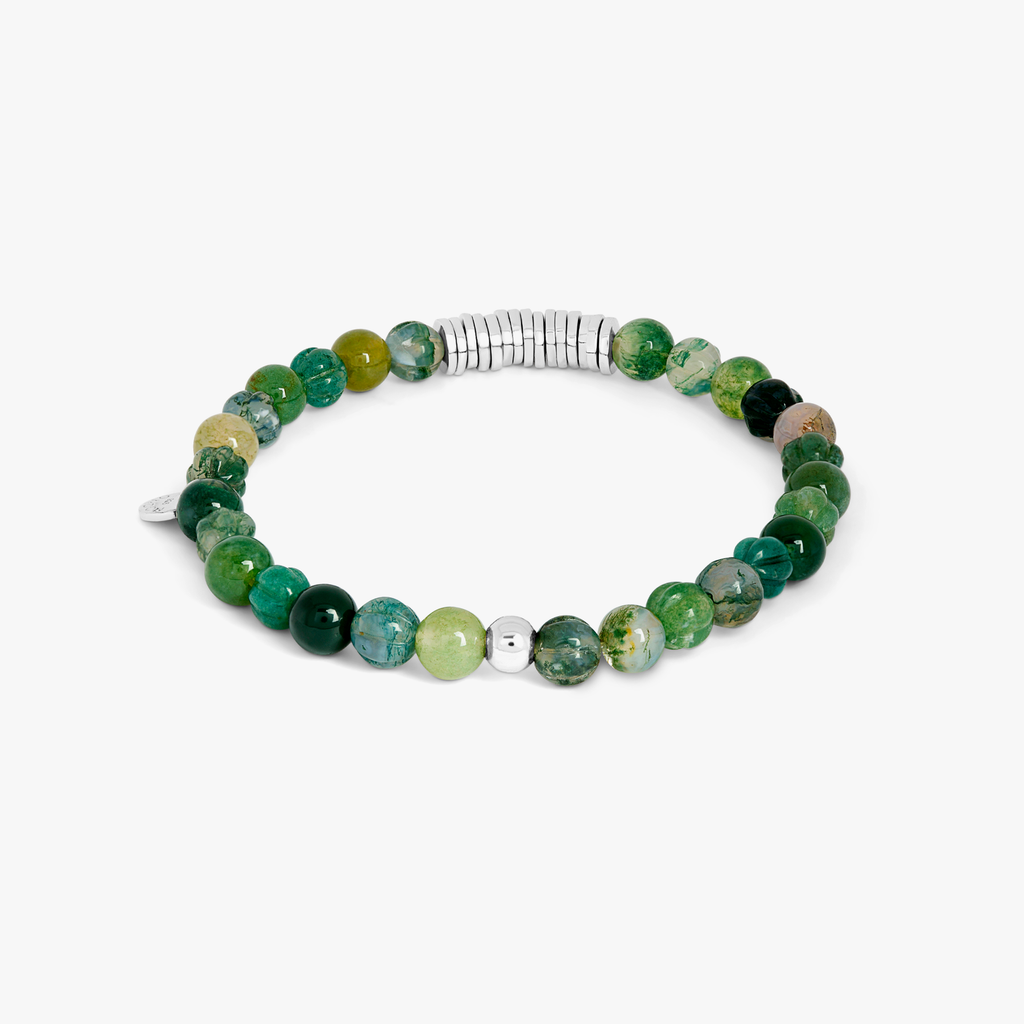 A rhodium-plated silver bracelet with green moss agate beads and sterling silver discs