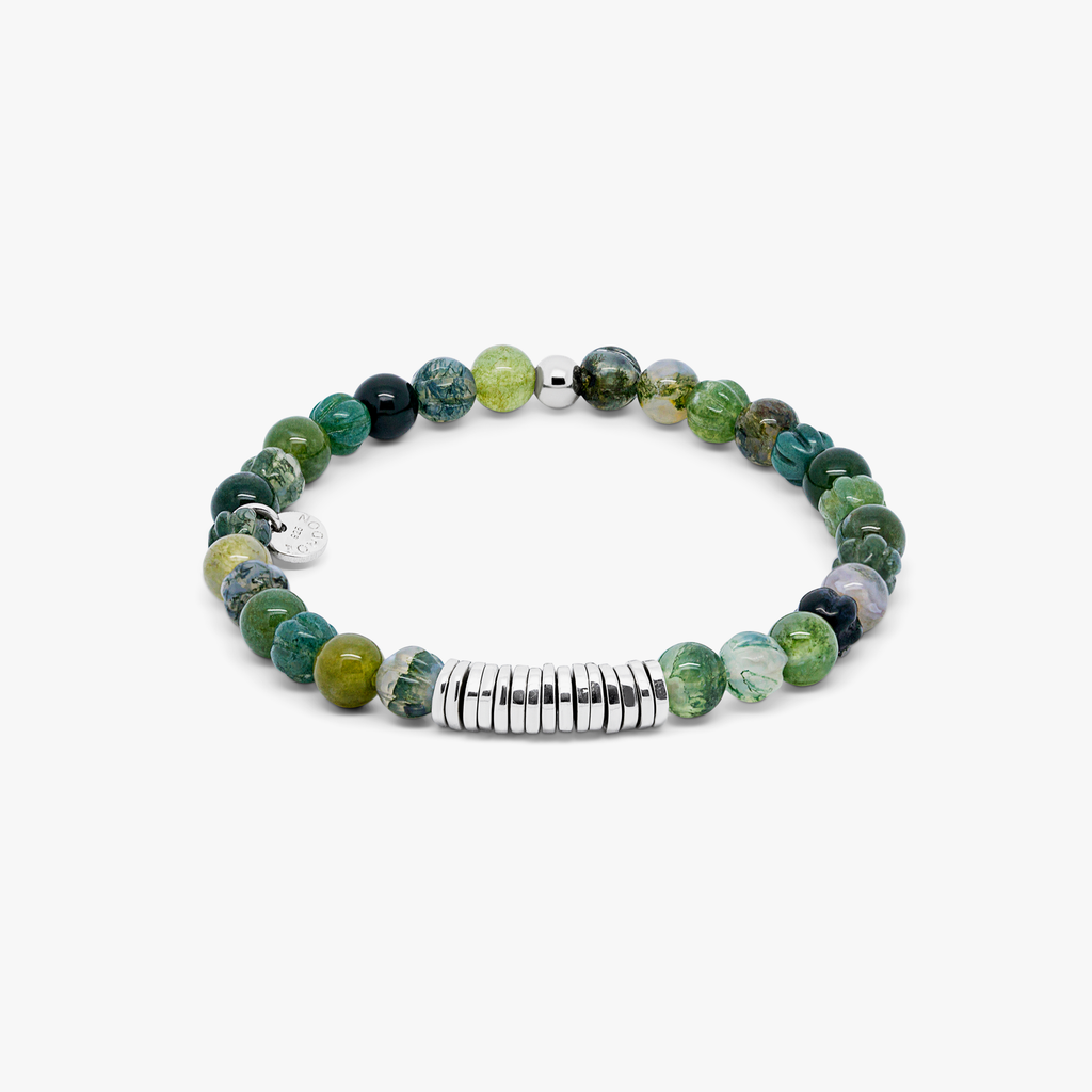 A rhodium-plated silver bracelet with green moss agate beads and sterling silver discs