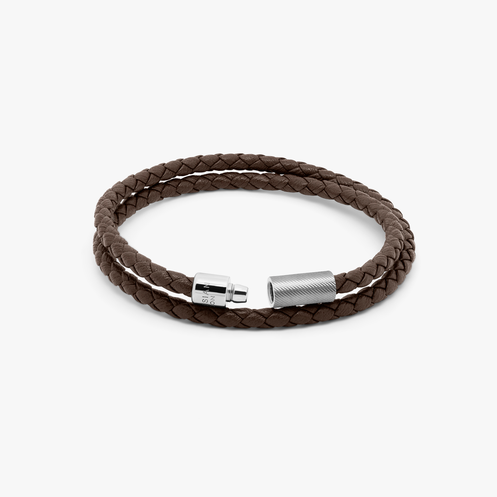 A double wrap brown leather bracelet with an engraved sterling silver clasp.