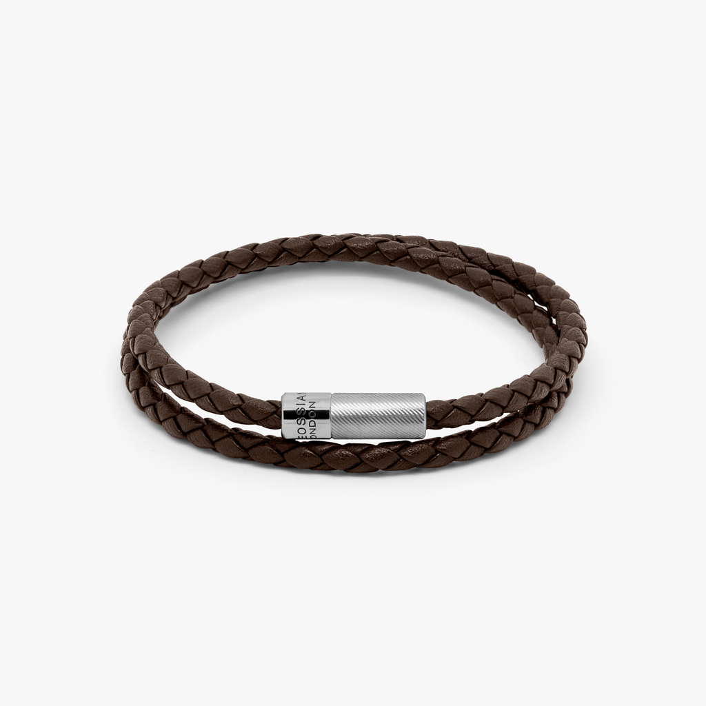 A double wrap brown leather bracelet with an engraved sterling silver clasp.