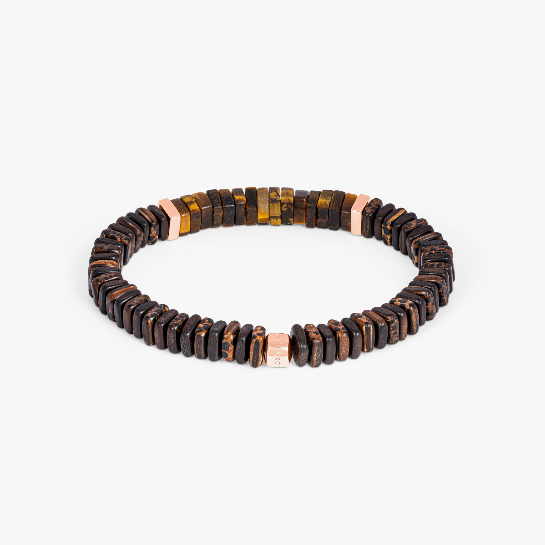 A bracelet made of tiger eye, palm and ebony wood with rose gold plated sterling silver accents.